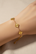 All Gold Clover Bracelet on Wrist Linen