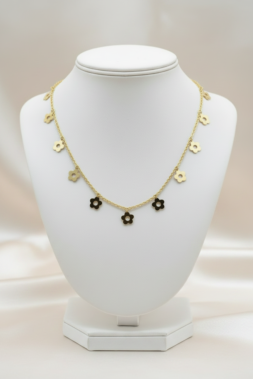 Gold daisy necklace light champagne silk background